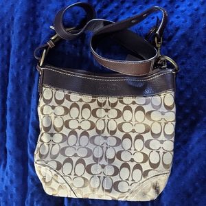 Classic brown Coach canvas hobo crossbody bag